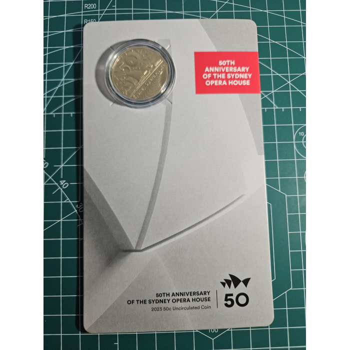 Opera house carded 50 cent coin