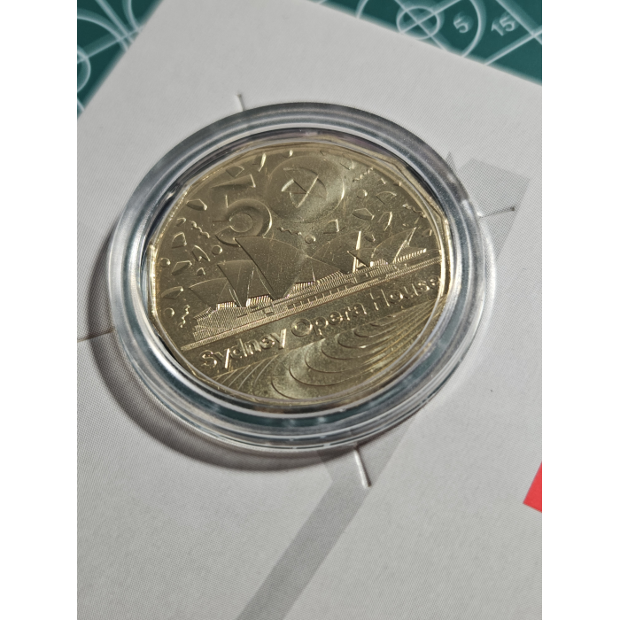 Opera house carded 50 cent coin