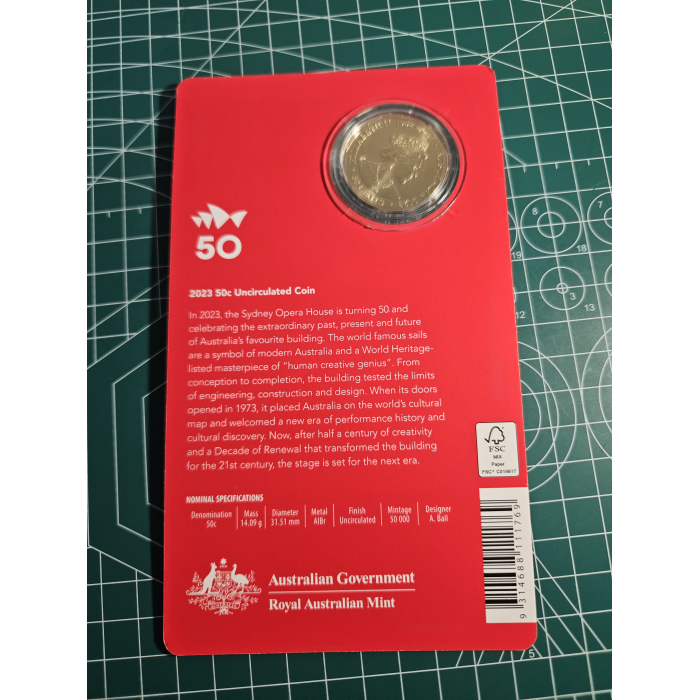 Opera house carded 50 cent coin