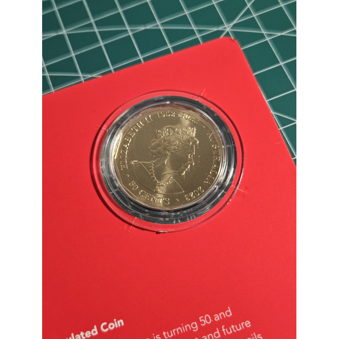 Opera house carded 50 cent coin